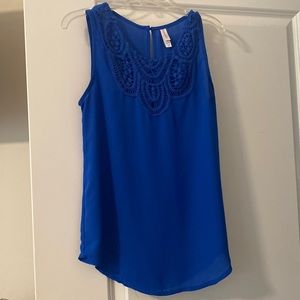Blue sleeveless blouse